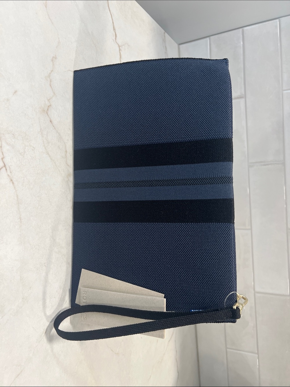 Rothy's Navy and Black Striped Wristlet Toiletry Pouch